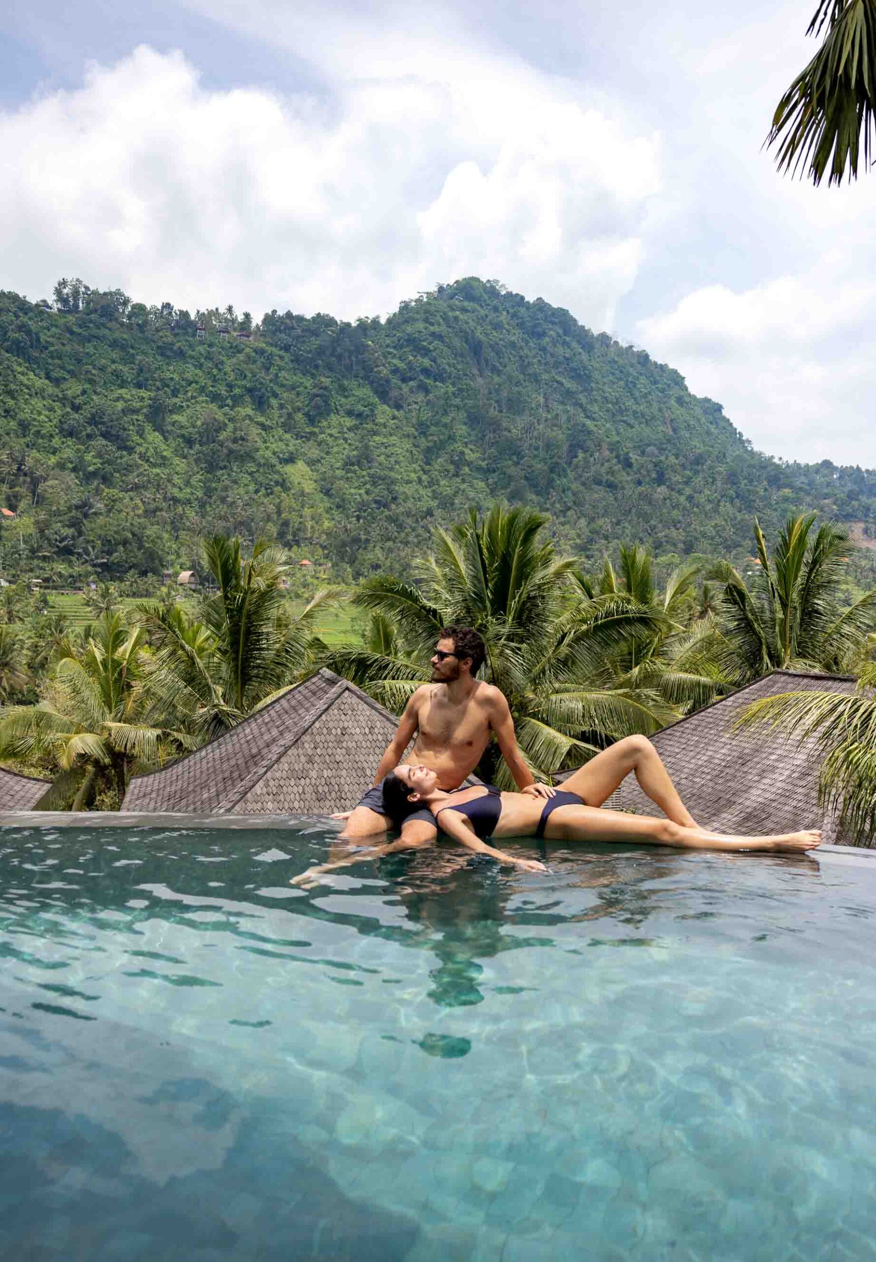 couple in pool at a five star hotel